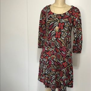 TianaB short baby doll dress with a floral pattern